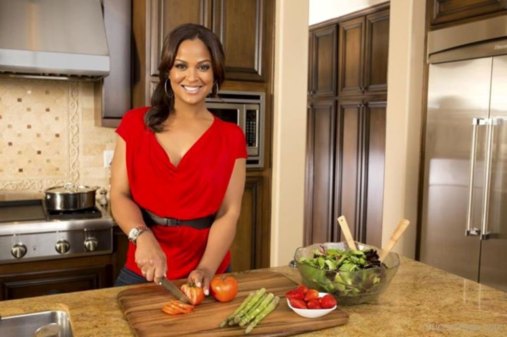 Laila Ali Wearing Red Top Super Wags Hottest Wives And