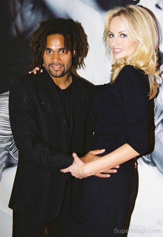 Adriana Karembeu And Christian Karembeu Are in Black Dress