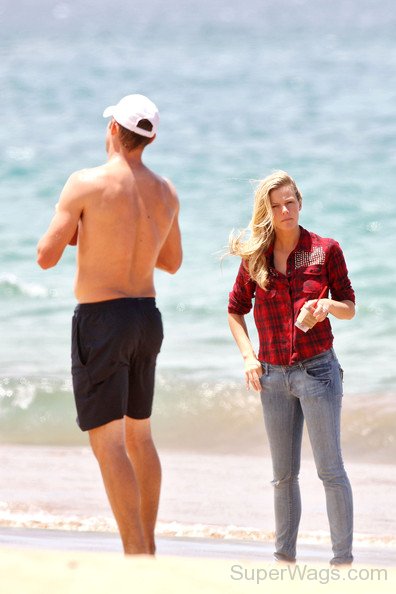 Brooklyn Decker and Andy Roddick Standing on Beach