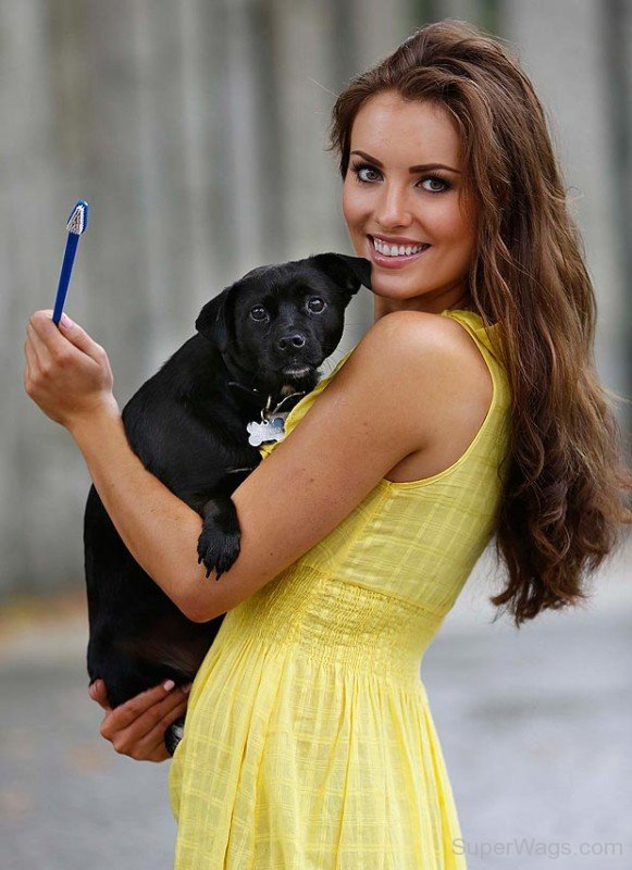 Holly Carpenter Holding Dog