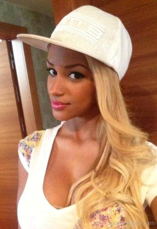 Fanny Neguesha Wearing White Cap