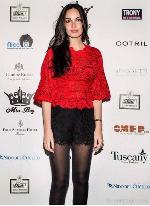 Michela Quattrociocche Wearing Red Top And Black Short