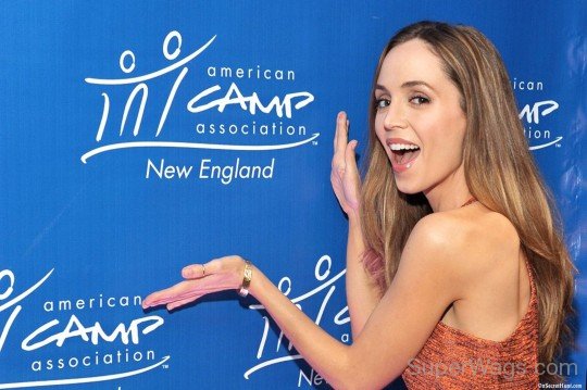 Joyful Eliza Dushku